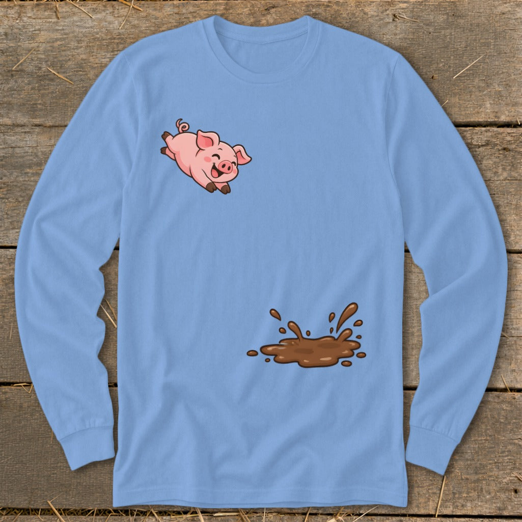 Light blue long sleeve shirt with a jumping cartoon pig and a mud splash.