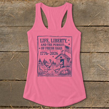 Pink tank top with graphic: "LIFE, LIBERTY, AND THE PURSUIT OF FRESH EGGS" with chickens and barn.