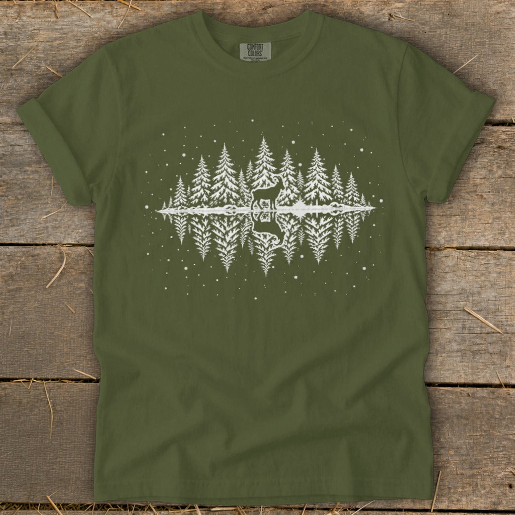 Olive green t-shirt with white reflection of deer and trees graphic.