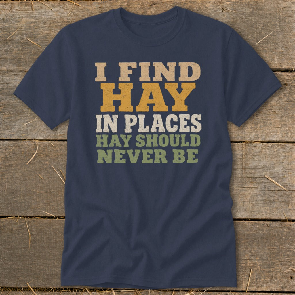 Navy t-shirt with text "I FIND HAY IN PLACES HAY SHOULD NEVER BE".
