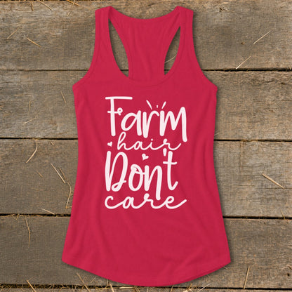 Red racerback tank top with white text reading "Farm hair Don't care".