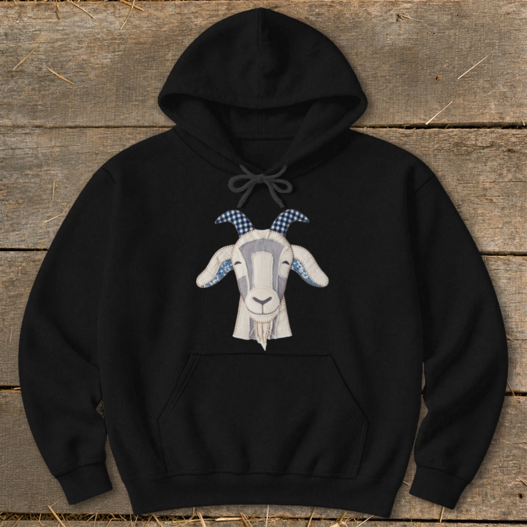 Black hoodie with a gray and white goat face applique, featuring blue gingham horns.
