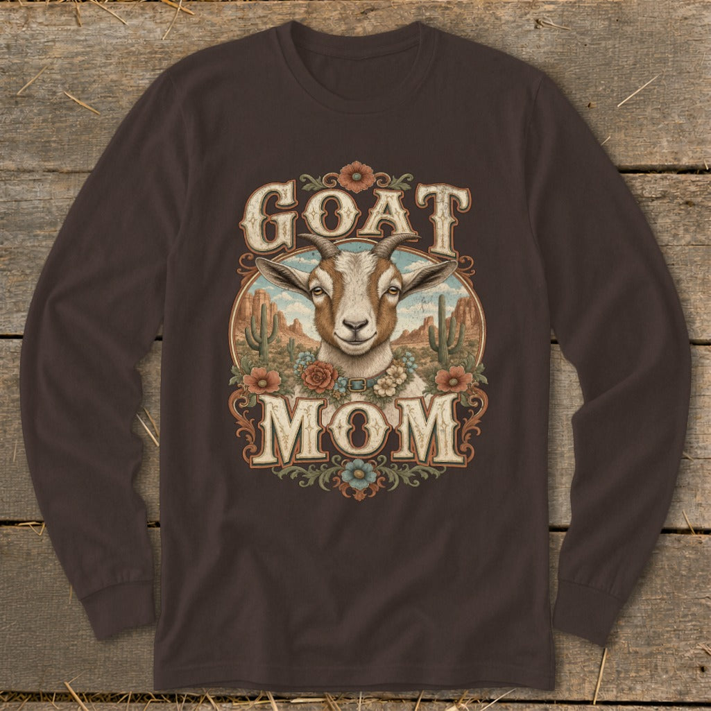 Brown long-sleeve shirt with "GOAT MOM" text and a goat in a desert landscape.