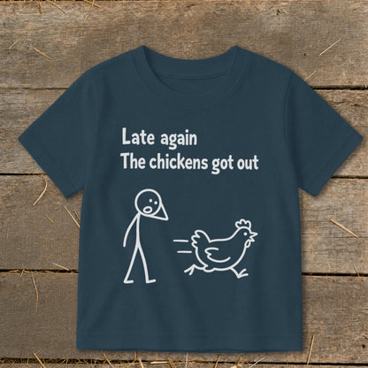 Dark blue t-shirt with white text "Late again The chickens got out" and stick figures.