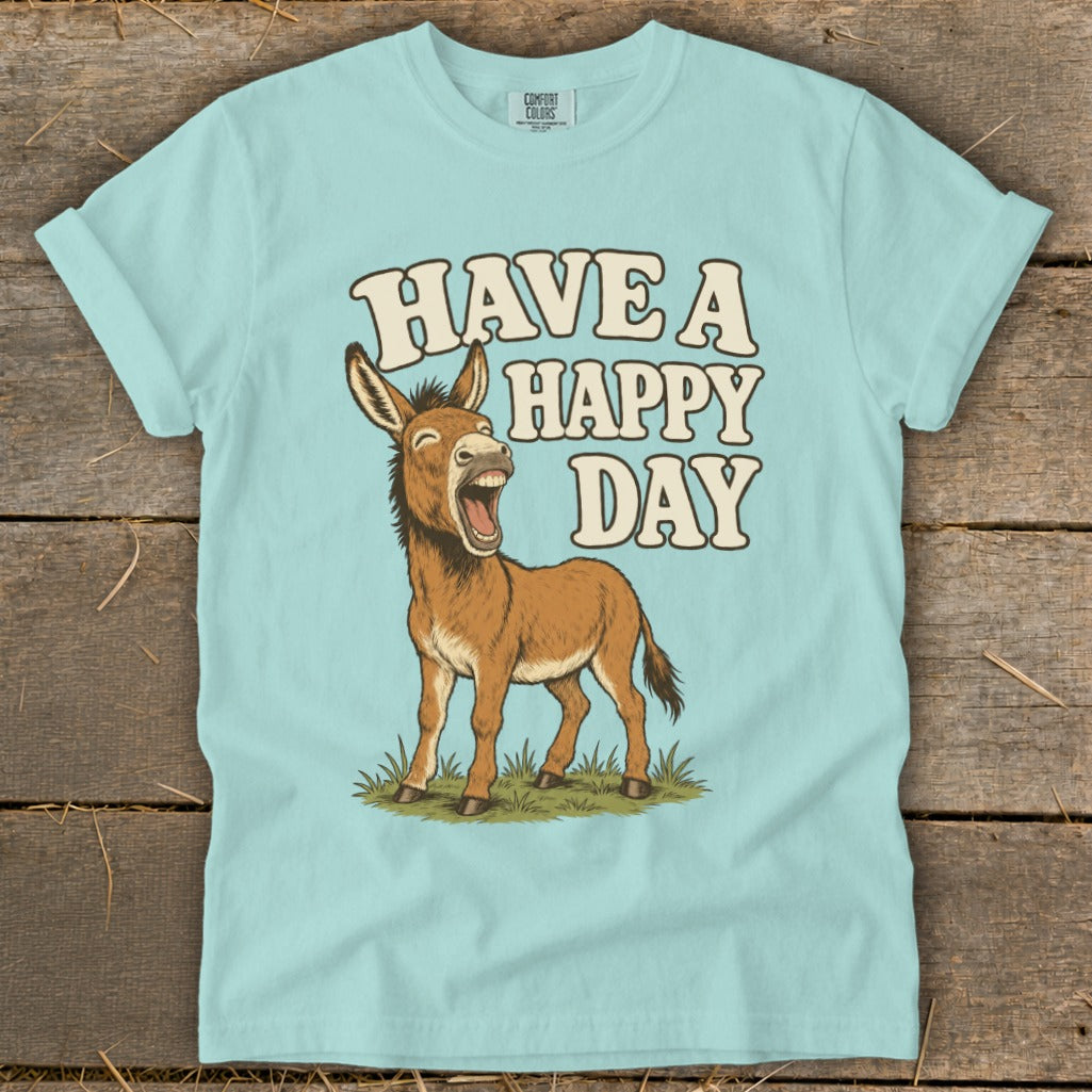 Light blue t-shirt with cartoon donkey and text "HAVE A HAPPY DAY".