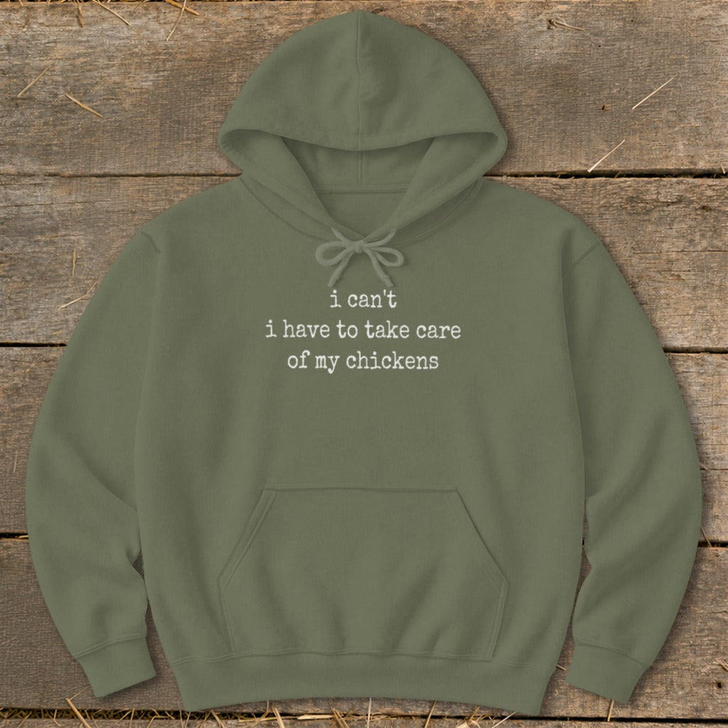 Olive green hoodie with white text "i can't i have to take care of my chickens".