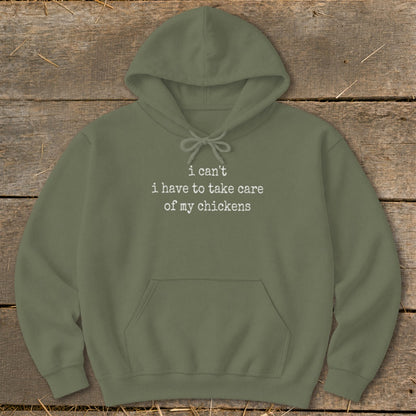 Olive green hoodie with white text "i can't i have to take care of my chickens".