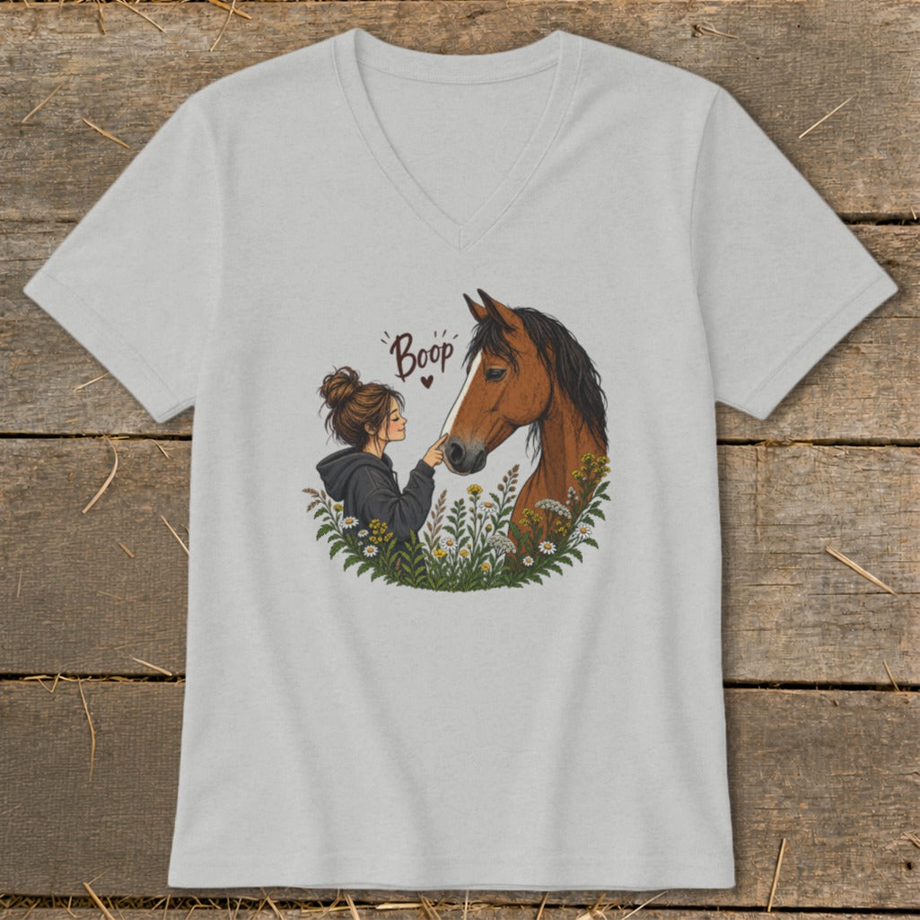 Illustration of girl touching horse's nose with "Boop" text.