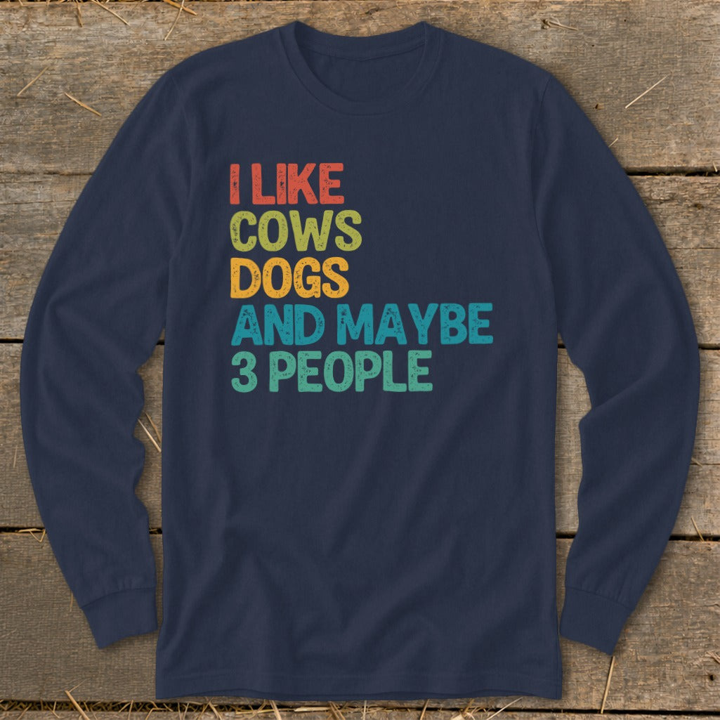 Navy long-sleeve shirt with text "I like cows dogs and maybe 3 people".