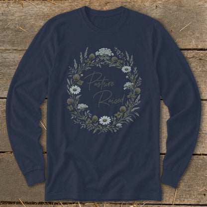 Navy long-sleeve shirt with a floral wreath graphic reading "Pasture Raised".
