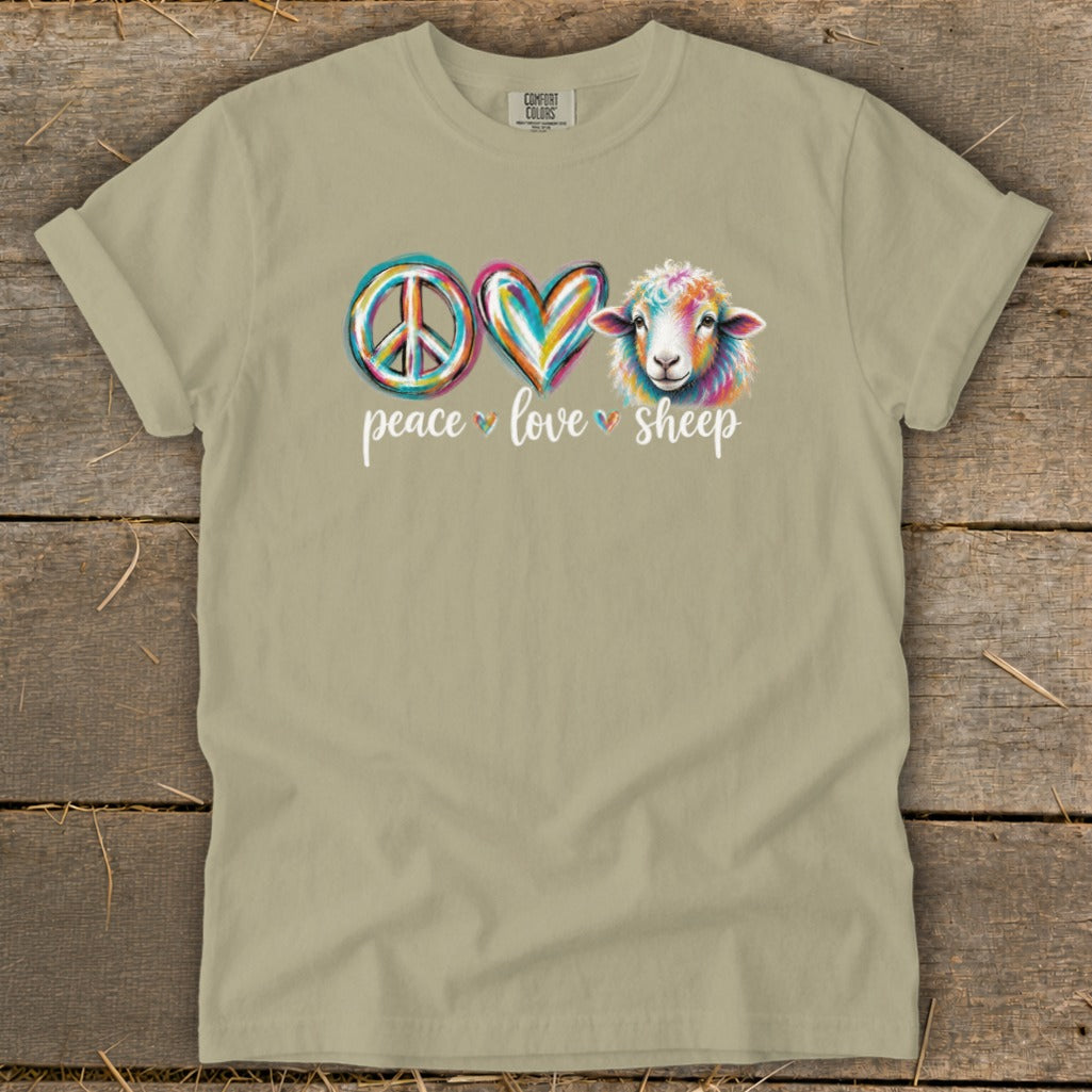 T-shirt with peace sign, heart, and colorful sheep graphic and text.