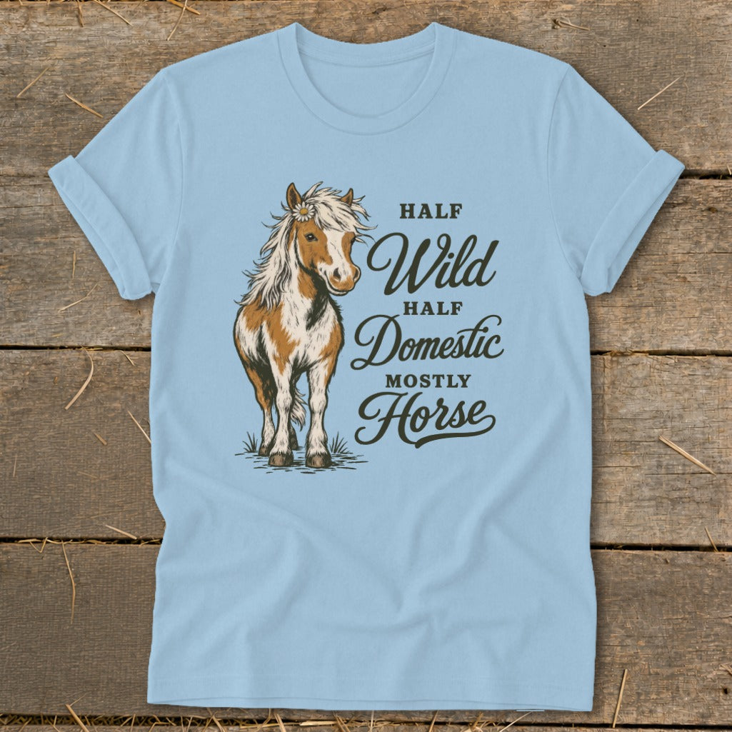 Light blue t-shirt with horse illustration and text "Half Wild Half Domestic Mostly Horse".