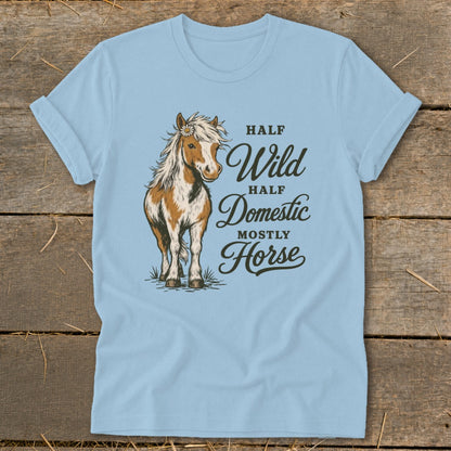 Light blue t-shirt with horse illustration and text "Half Wild Half Domestic Mostly Horse".