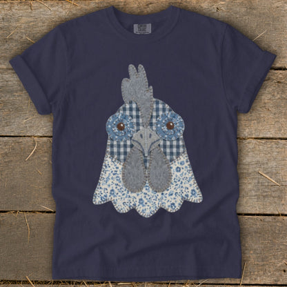 Navy t-shirt featuring a blue and white patchwork chicken head graphic.