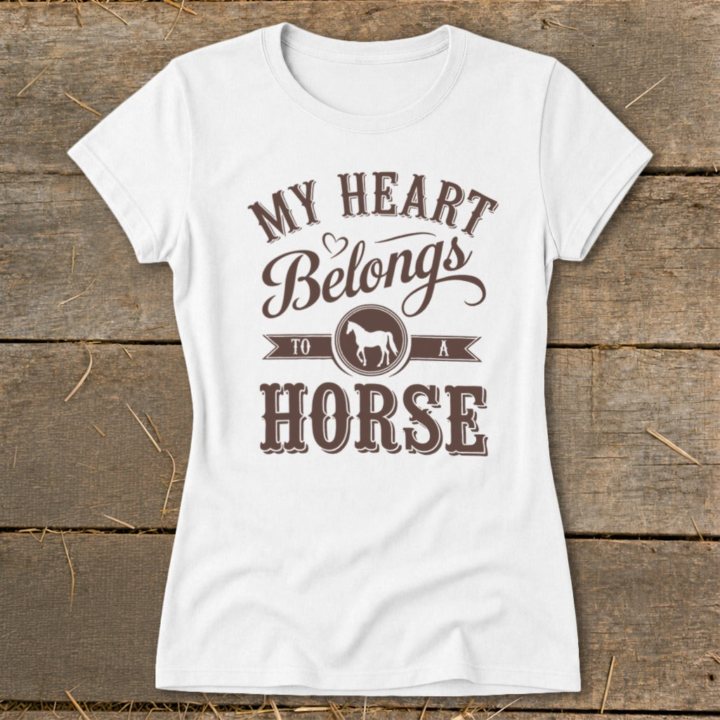 White t-shirt with brown text and horse graphic: "MY HEART Belongs TO A HORSE".