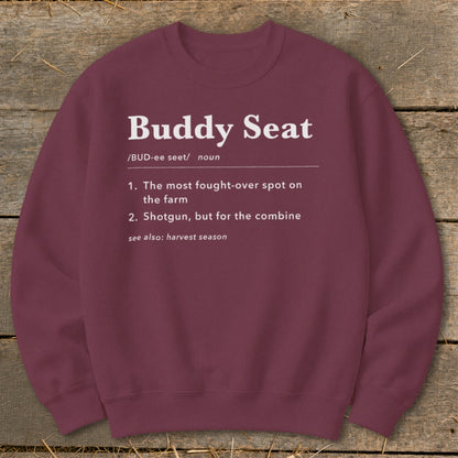 Maroon sweatshirt with "Buddy Seat" definition in white text.