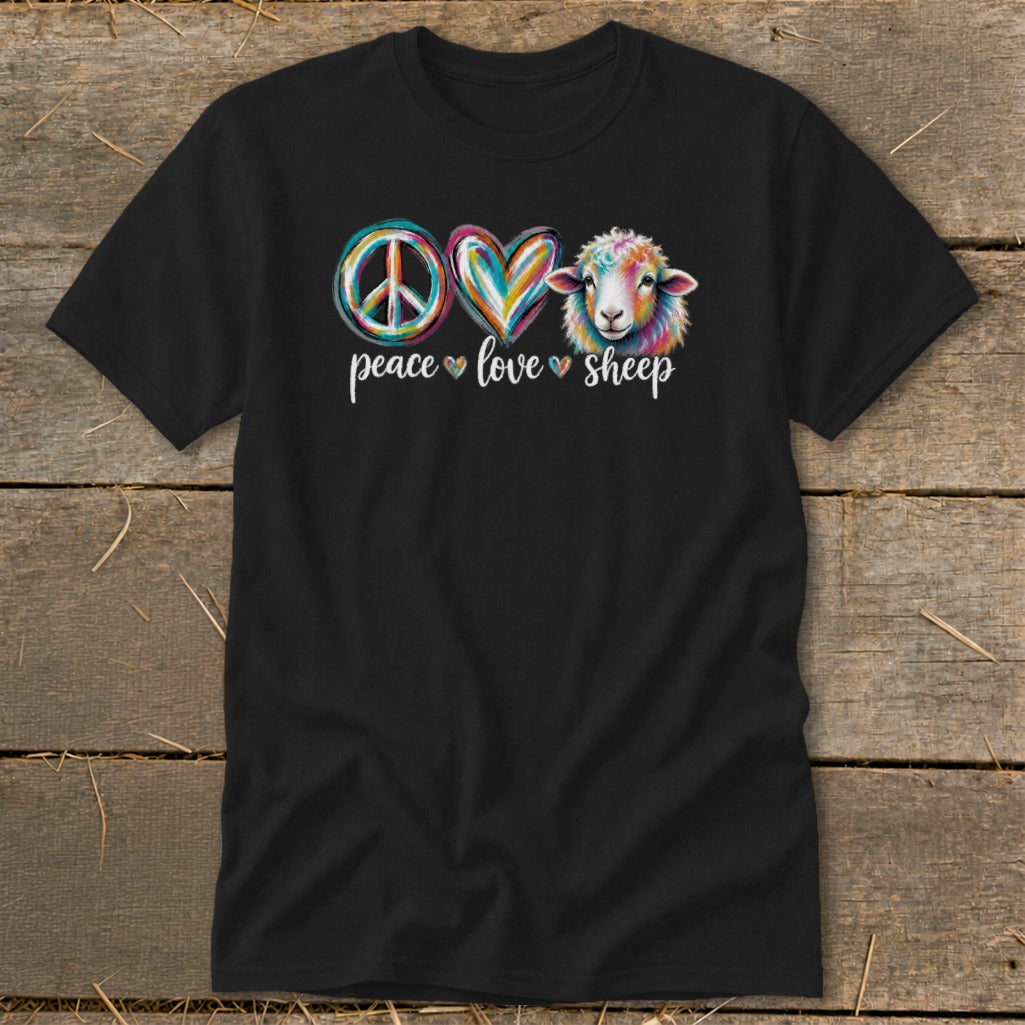 Black t-shirt with a peace sign, heart, and colorful sheep graphic and text.