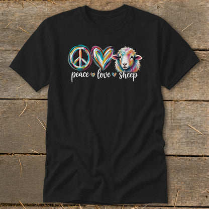 Black t-shirt with a peace sign, heart, and colorful sheep graphic and text.