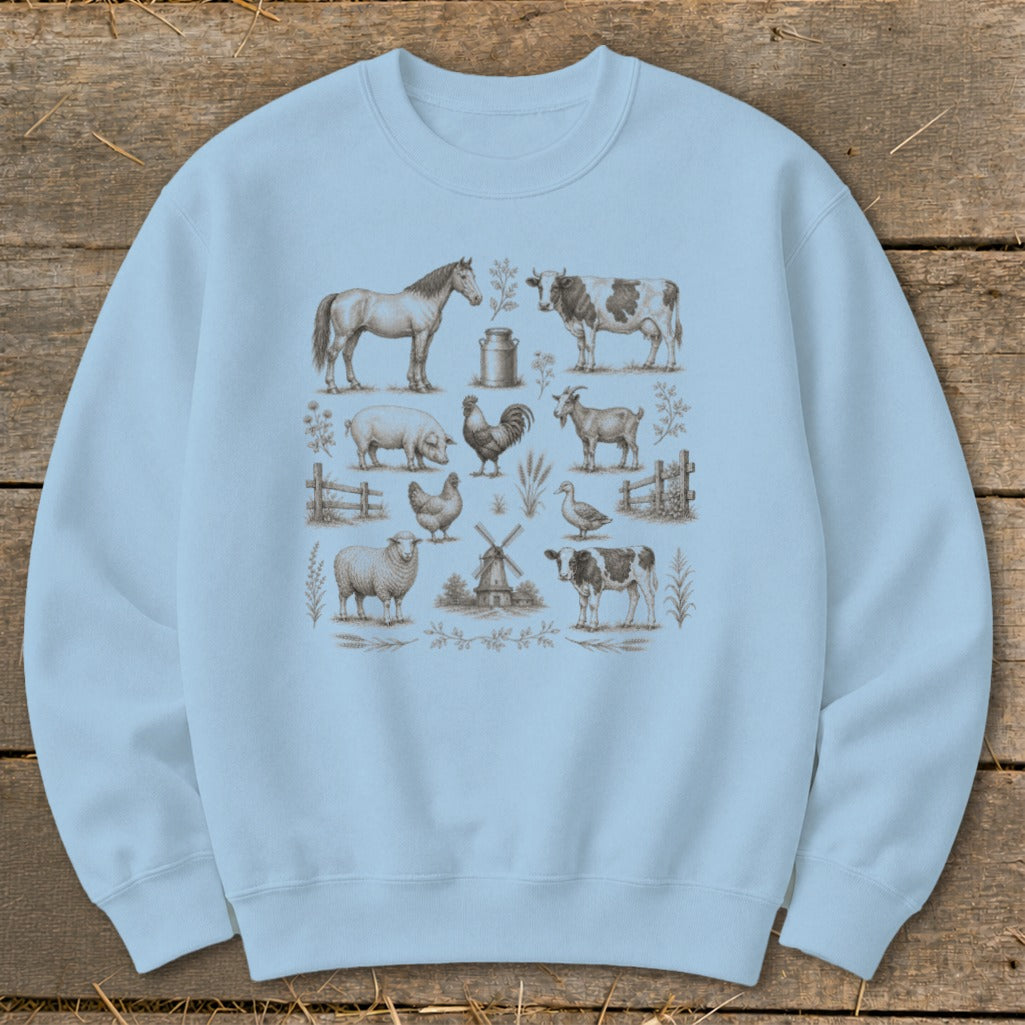 Light blue sweatshirt with vintage farm animal illustrations: horse, cow, pig, chicken, goat, sheep, duck, windmill.