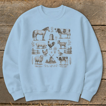 Light blue sweatshirt with vintage farm animal illustrations: horse, cow, pig, chicken, goat, sheep, duck, windmill.