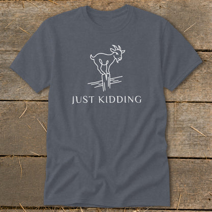 Gray t-shirt with a white outline of a goat balancing on a fence, with text "JUST KIDDING".