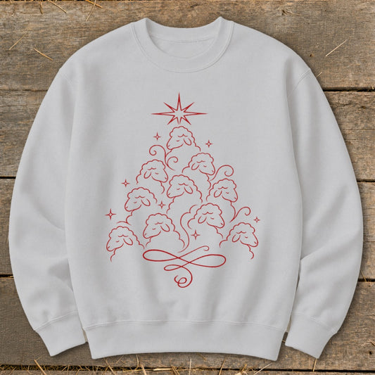 White sweatshirt with red sheep tree design and star.