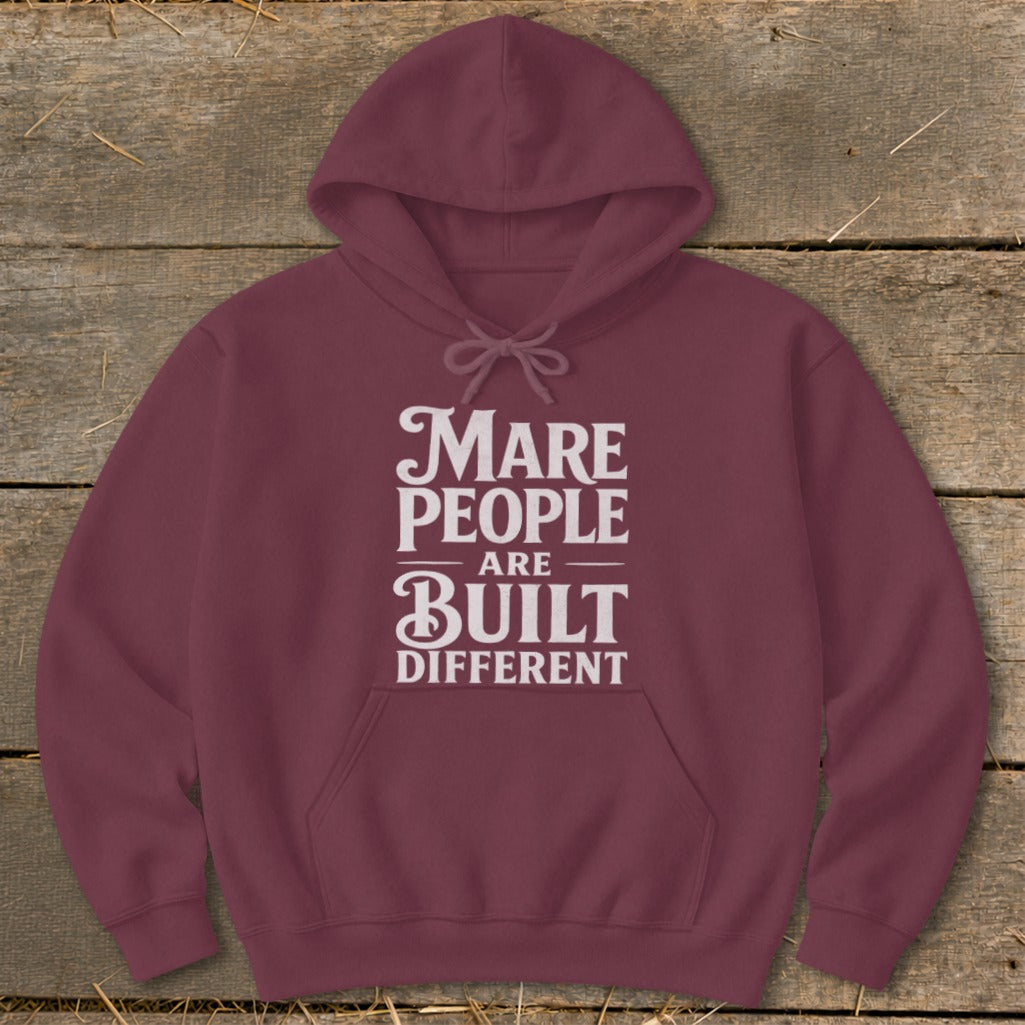 Maroon hoodie with "Mare People Are Built Different" text in white.