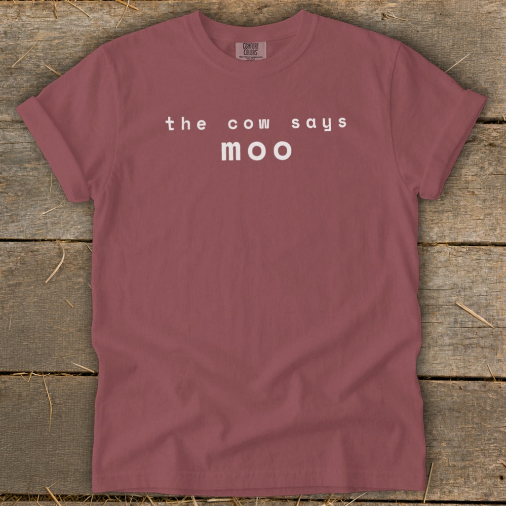 Maroon t-shirt with white text "the cow says moo".