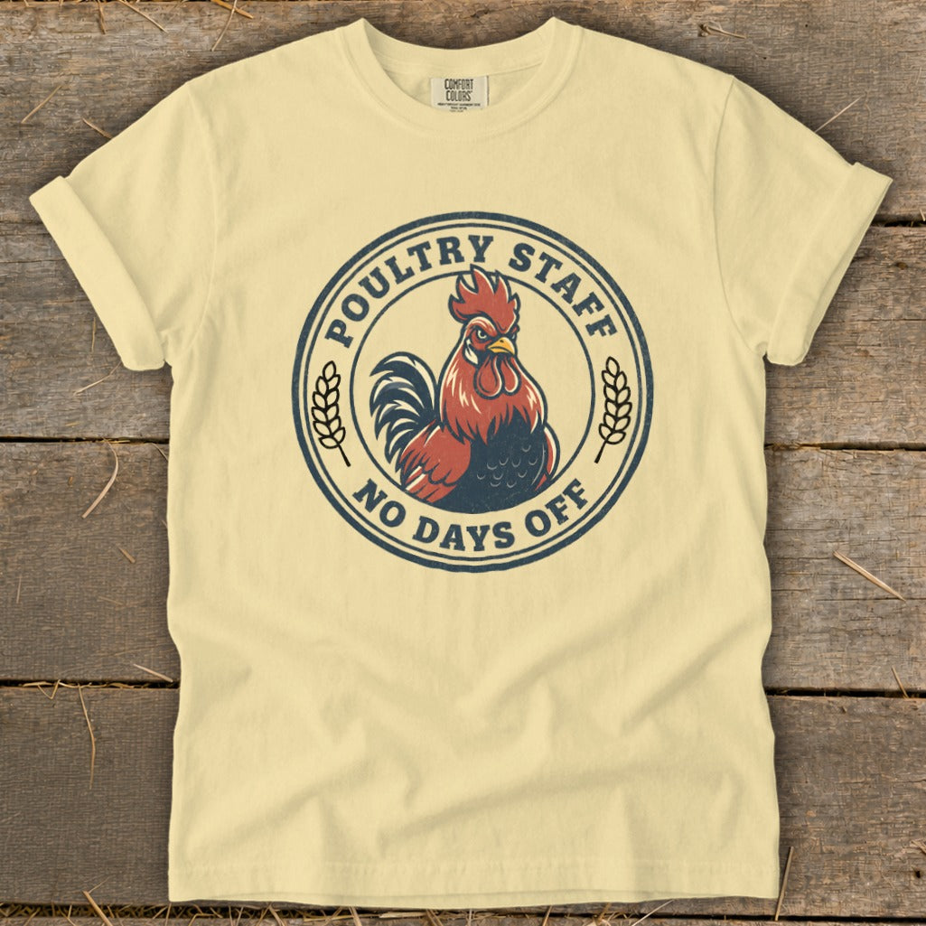 Cream t-shirt with a circular graphic of a rooster and text: Poultry Staff, No Days Off.