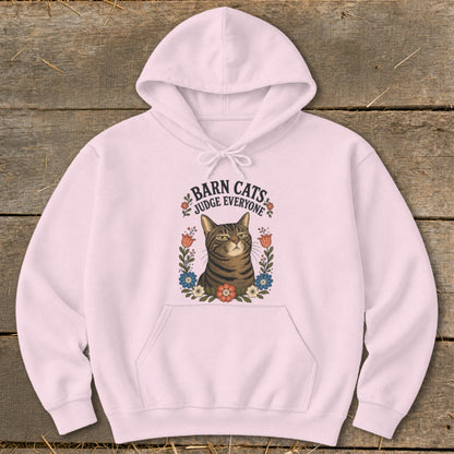 Pink hoodie with a tabby cat and text "Barn Cats Judge Everyone".