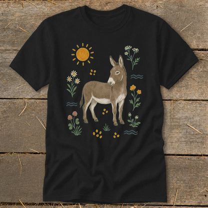 Black t-shirt with a brown donkey illustration and colorful flowers, sun, and yellow dots.