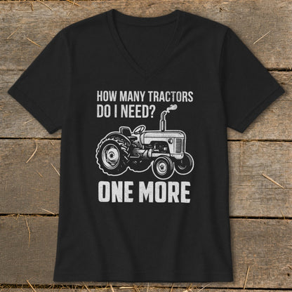 Black t-shirt with "How Many Tractors Do I Need? One More" text and tractor graphic.