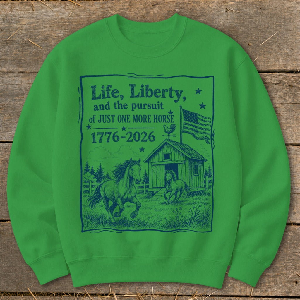 Green sweatshirt with dark blue graphic of horses, barn, American flag, and text.