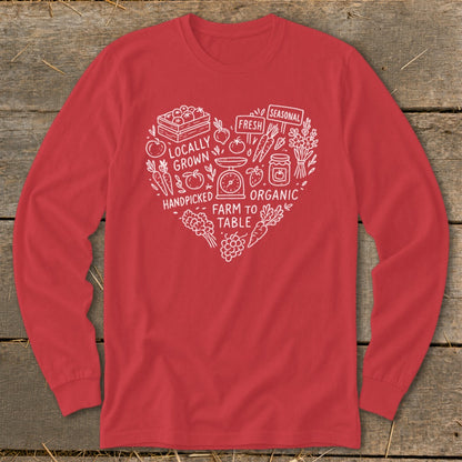 Red long-sleeve shirt with white heart design of produce and text.