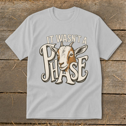 Light grey t-shirt with a goat's head and text "IT WASN'T A PHASE".