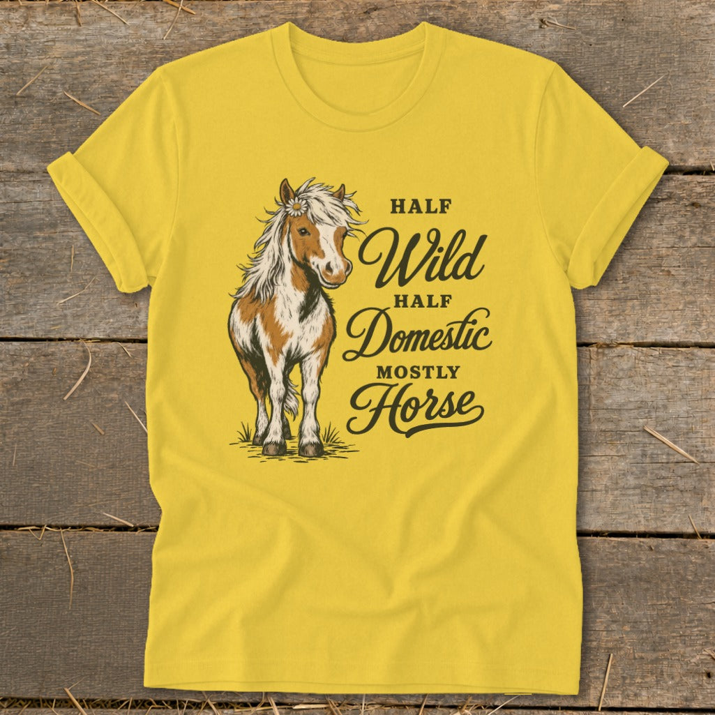 Yellow t-shirt with a horse graphic and text "Half Wild Half Domestic Mostly Horse."