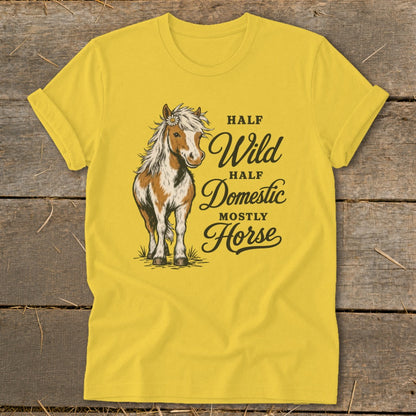 Yellow t-shirt with a horse graphic and text "Half Wild Half Domestic Mostly Horse."