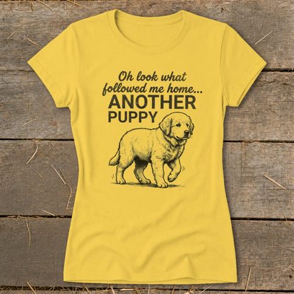 Yellow t-shirt with a puppy drawing and text "Oh look what followed me home... ANOTHER PUPPY".