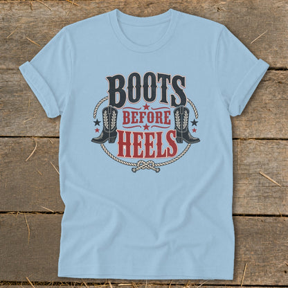 Light blue t-shirt with "Boots Before Heels" graphic featuring cowboy boots and rope.