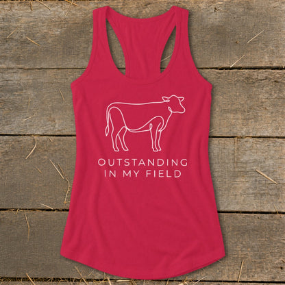 Pink racerback tank top with a white line drawing of a cow and text.