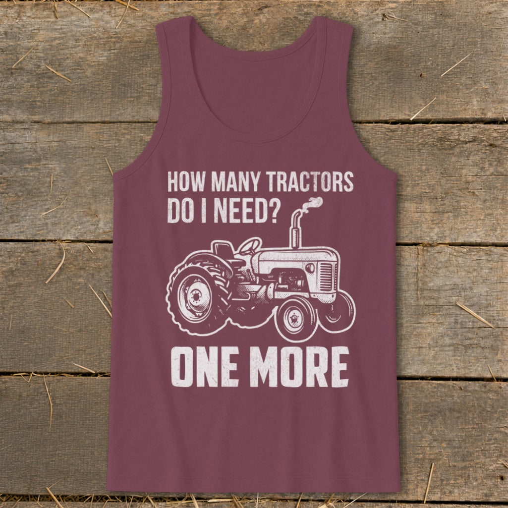 Burgundy tank top with white graphic of a tractor and text "HOW MANY TRACTORS DO I NEED? ONE MORE".