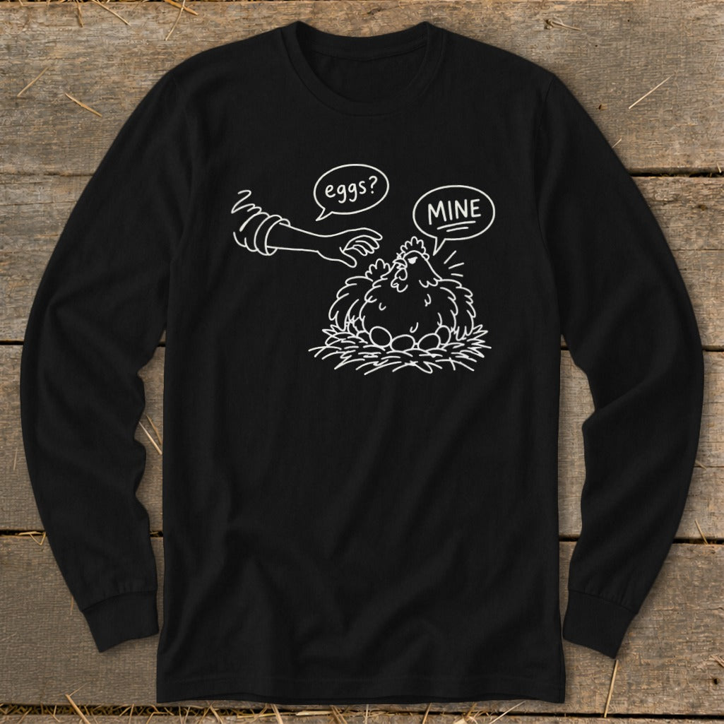Long sleeve black t-shirt with illustration of chicken guarding eggs with text "MINE".