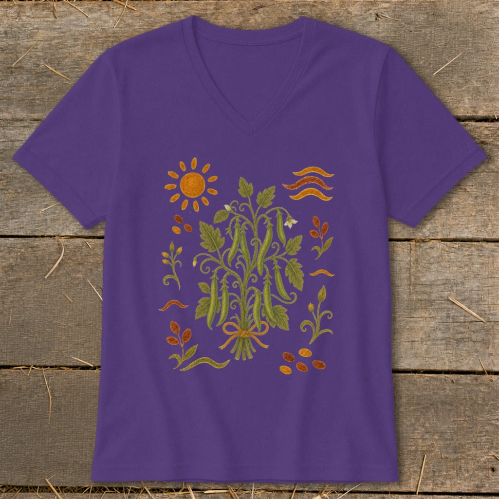 Purple v-neck t-shirt with a vintage-style illustration of pea pods and gardening elements.