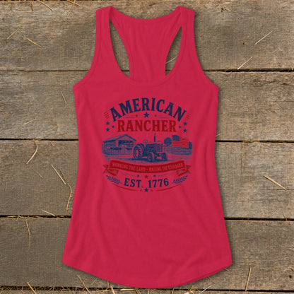 Red tank top with "American Rancher" graphic featuring a tractor, barn, and flag.