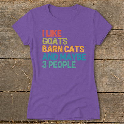 Purple t-shirt with "I like goats, barn cats and maybe 3 people" text.