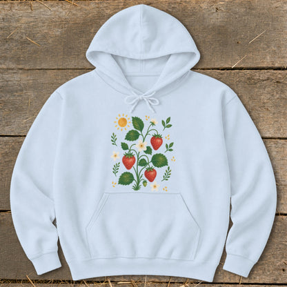 Light blue hoodie with a whimsical strawberry plant and sun graphic design.