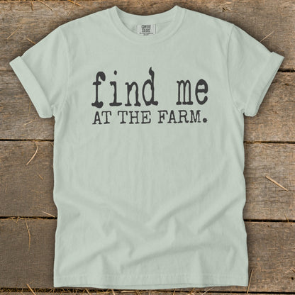 Light mint green t-shirt with "find me AT THE FARM." printed in black.