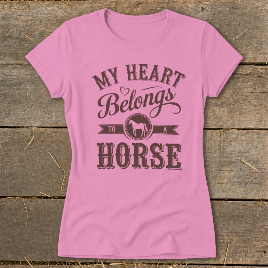 Pink t-shirt with brown text reading "My Heart Belongs To A Horse" and a horse silhouette.