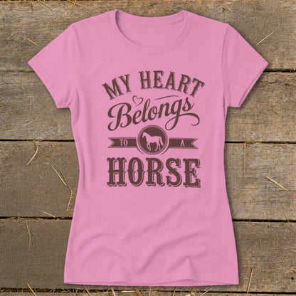 Pink t-shirt with brown text reading "My Heart Belongs To A Horse" and a horse silhouette.