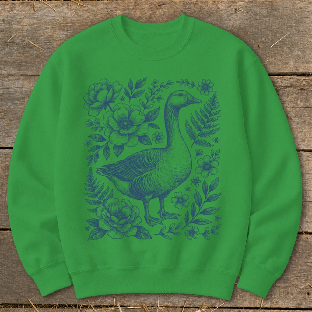 Green sweatshirt with blue graphic of a goose and floral accents.
